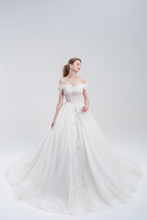 Load image into Gallery viewer, 
Off-the-shoulder ball gown wedding dress with sparkling tulle, beaded bodice, and voluminous skirt for a romantic, princess-inspired bridal look
