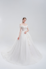 Load image into Gallery viewer, 
Off-the-shoulder ball gown wedding dress with sparkling tulle, beaded bodice, and voluminous skirt for a romantic, princess-inspired bridal look
