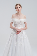 Load image into Gallery viewer, A-line wedding dress with convertible off-shoulder to strapless design, lace and bead details, and a shimmering tulle skirt for a romantic, elegant bridal look
