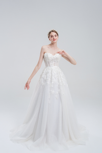 A-line wedding dress with convertible off-shoulder to strapless design, lace and bead details, and a shimmering tulle skirt for a romantic, elegant bridal look