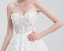 Load image into Gallery viewer, A-line wedding dress with convertible off-shoulder to strapless design, lace and bead details, and a shimmering tulle skirt for a romantic, elegant bridal look
