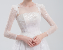 Load image into Gallery viewer, Elegant A-line wedding dress with long lace sleeves, sequin lace fabric, and intricate bead embroidery for a timeless, romantic bridal look.
