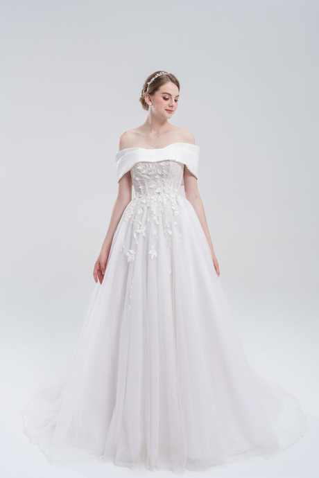 A-line wedding dress with off-the-shoulder satin bodice, lace and bead embellishments, and a sparkling tulle skirt for a classic, elegant bridal look