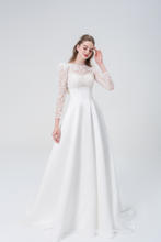 Load image into Gallery viewer, A stunning A-line wedding dress with long sleeves, flowing silhouette, soft fabric, and timeless elegance, perfect for modern and classic brides

