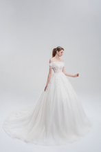 Load image into Gallery viewer, 2-in-1 ball gown wedding dress with off-the-shoulder and strapless options, sparkling tulle, beading, and a voluminous princess-style skirt
