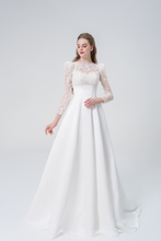 Load image into Gallery viewer, A stunning A-line wedding dress with long sleeves, flowing silhouette, soft fabric, and timeless elegance, perfect for modern and classic brides
