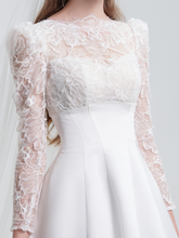 Load image into Gallery viewer, A stunning A-line wedding dress with long sleeves, flowing silhouette, soft fabric, and timeless elegance, perfect for modern and classic brides
