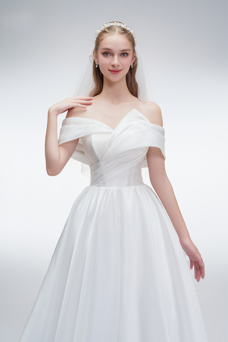 Off-shoulder organza A-line wedding dress with pleated bodice – romantic and lightweight bridal gown