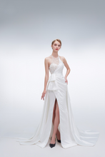 Load image into Gallery viewer, Elegant mermaid wedding dress with halter neckline, beaded details, high slit, and long train – modern bridal gown
