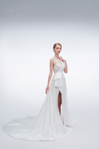 Elegant mermaid wedding dress with halter neckline, beaded details, high slit, and long train – modern bridal gown