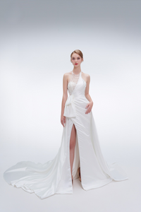 Elegant mermaid wedding dress with halter neckline, beaded details, high slit, and long train – modern bridal gown