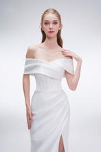 Load image into Gallery viewer, Off-shoulder satin mermaid wedding dress with high slit and figure-hugging silhouette – chic and glamorous bridal gown
