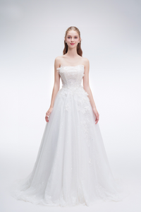 Elegant A-line wedding dress with strapless neckline, sparkling tulle fabric, bead & floral embellishments – romantic bridal gown