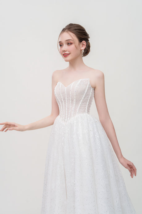 Strapless lace A-line wedding dress with sequins, corset bodice and beaded embellishments – timeless romantic bridal gown