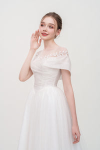 Off-shoulder tulle A-line wedding dress with bead and leaf lace embellishments – ethereal bridal gown